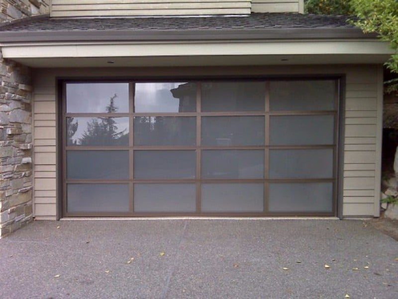 Bronze framed full view garage door with frosted grid glass